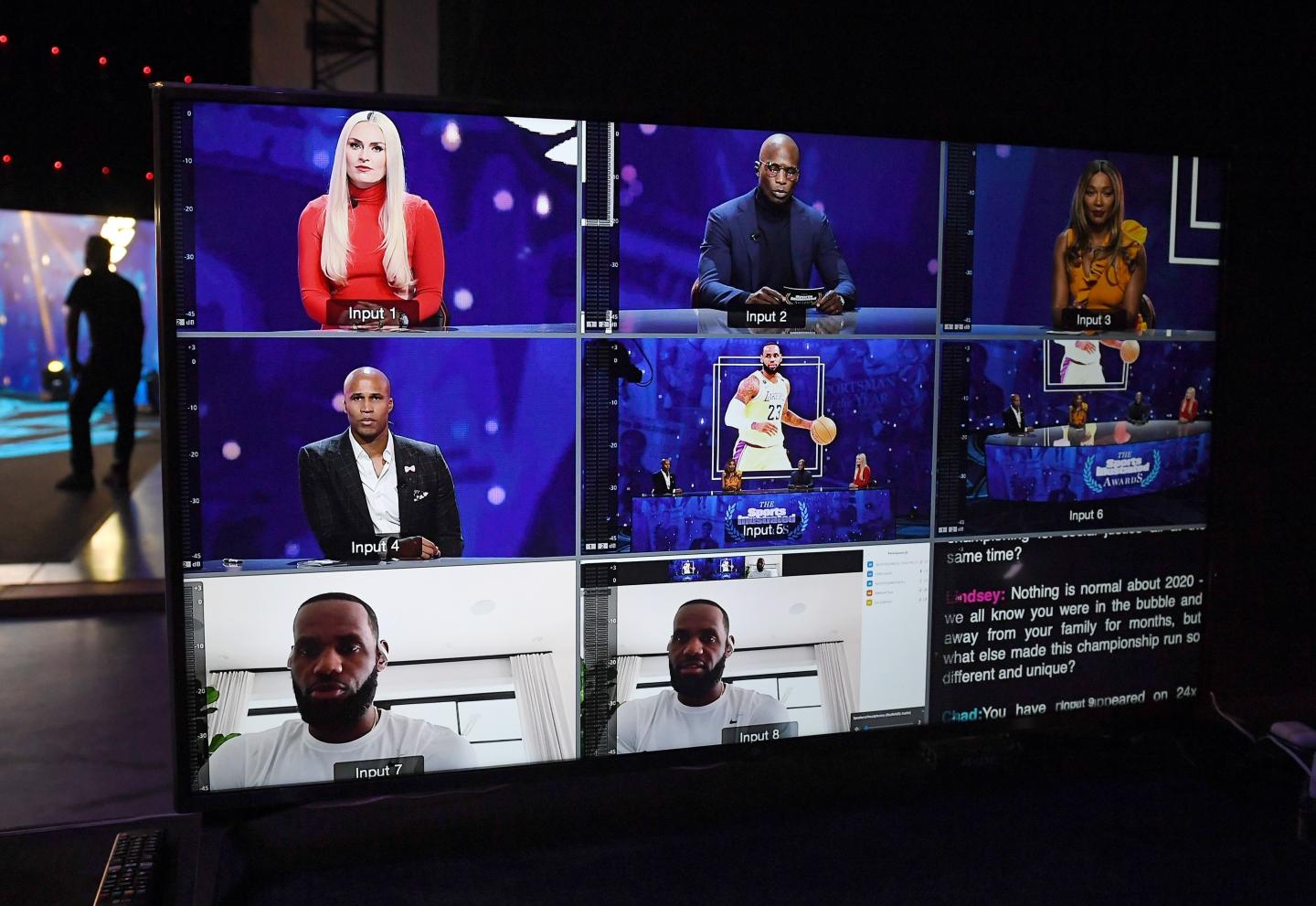 In this image released on December 19, 2020, NBA player LeBron James (below) is shown on a screen via the Zoom videoconferencing software as he accepts the Sportsperson of the Year award and the Muhammad Ali Legacy Award from hosts Richard Jefferson, Cari Champion, Chad "Ochocinco" Johnson and Lindsey Vonn during the 2020 Sports Illustrated Awards at AG Production Services on December 10, 2020 in North Las Vegas, Nevada.