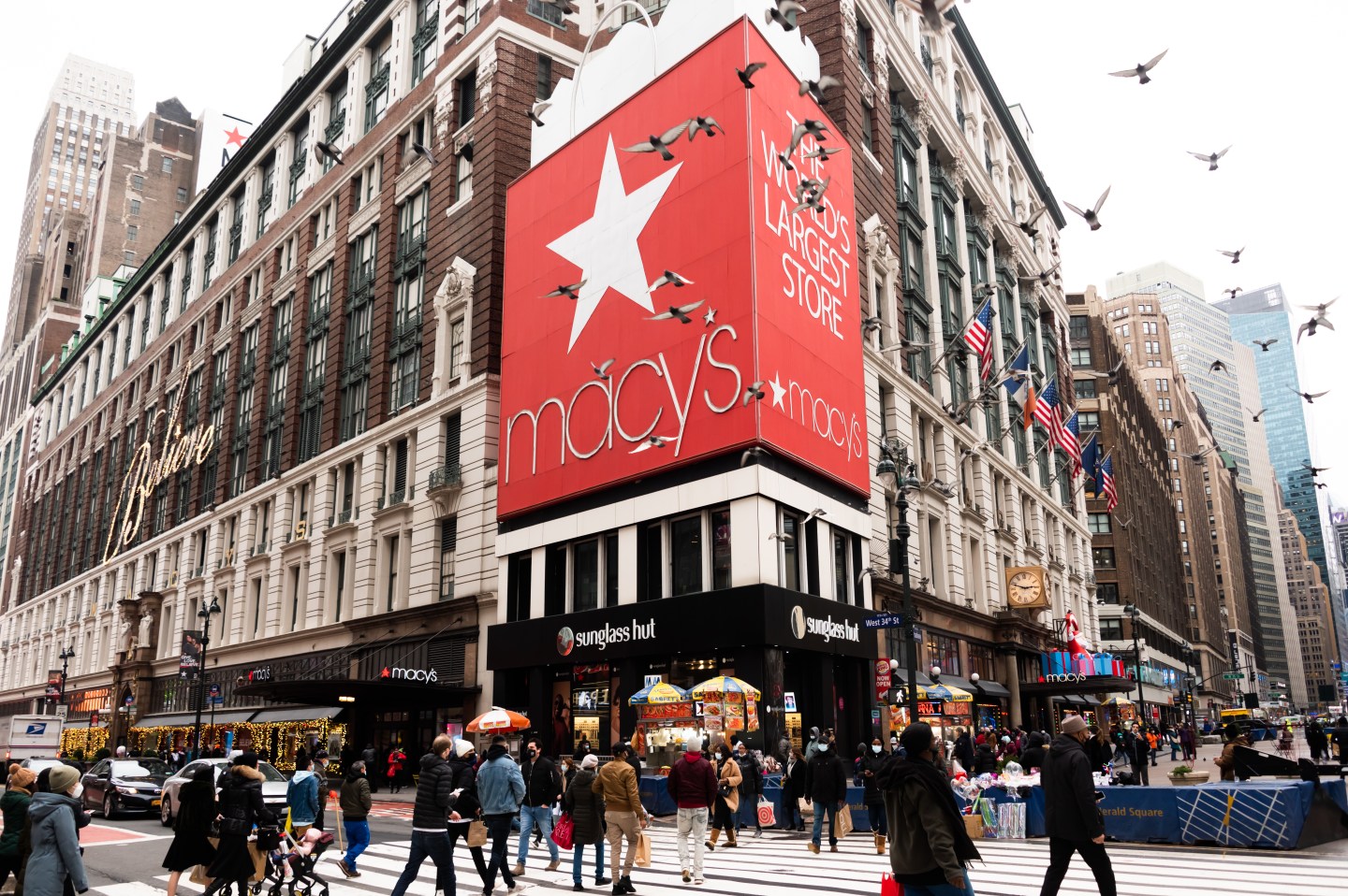 People walk outside Macy's Herald Square on December 31, 2020 in New York City.