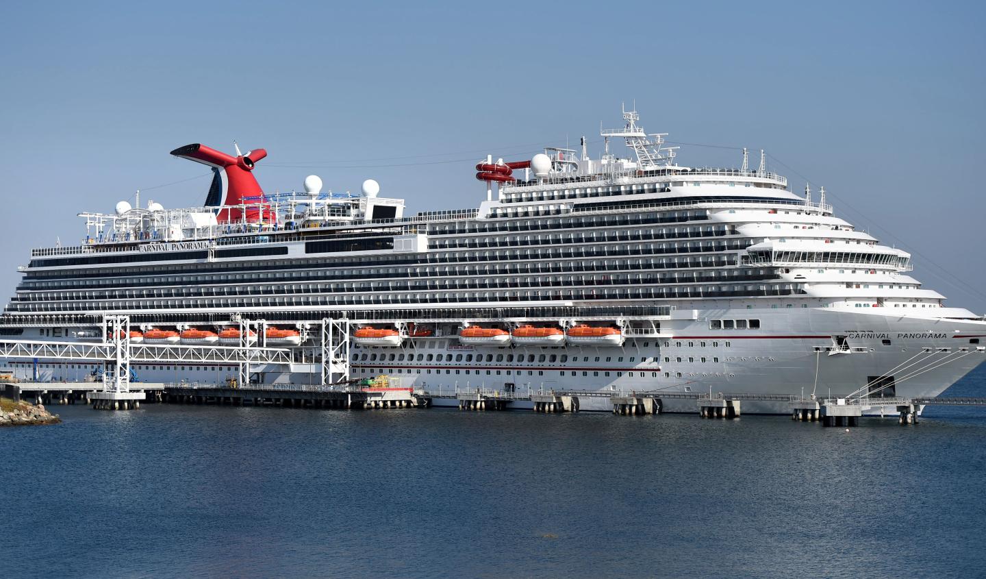 Carnival cancels more cruises and Bond flick postponed again in latest signs of tough COVID-19 slog