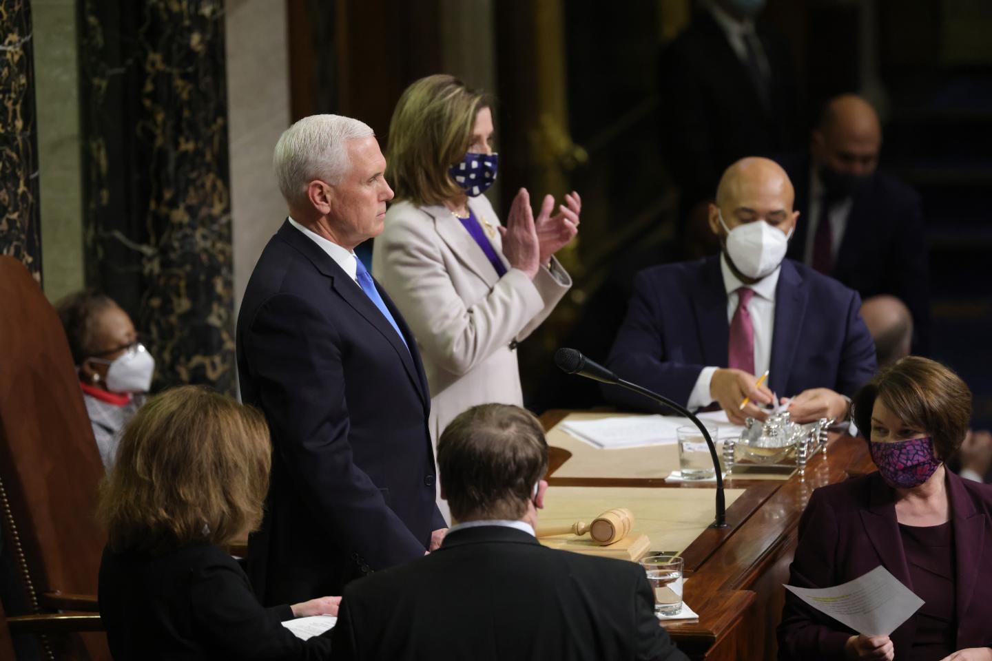 Pence declares Biden winner of presidential election after Congress defies mob to certify votes