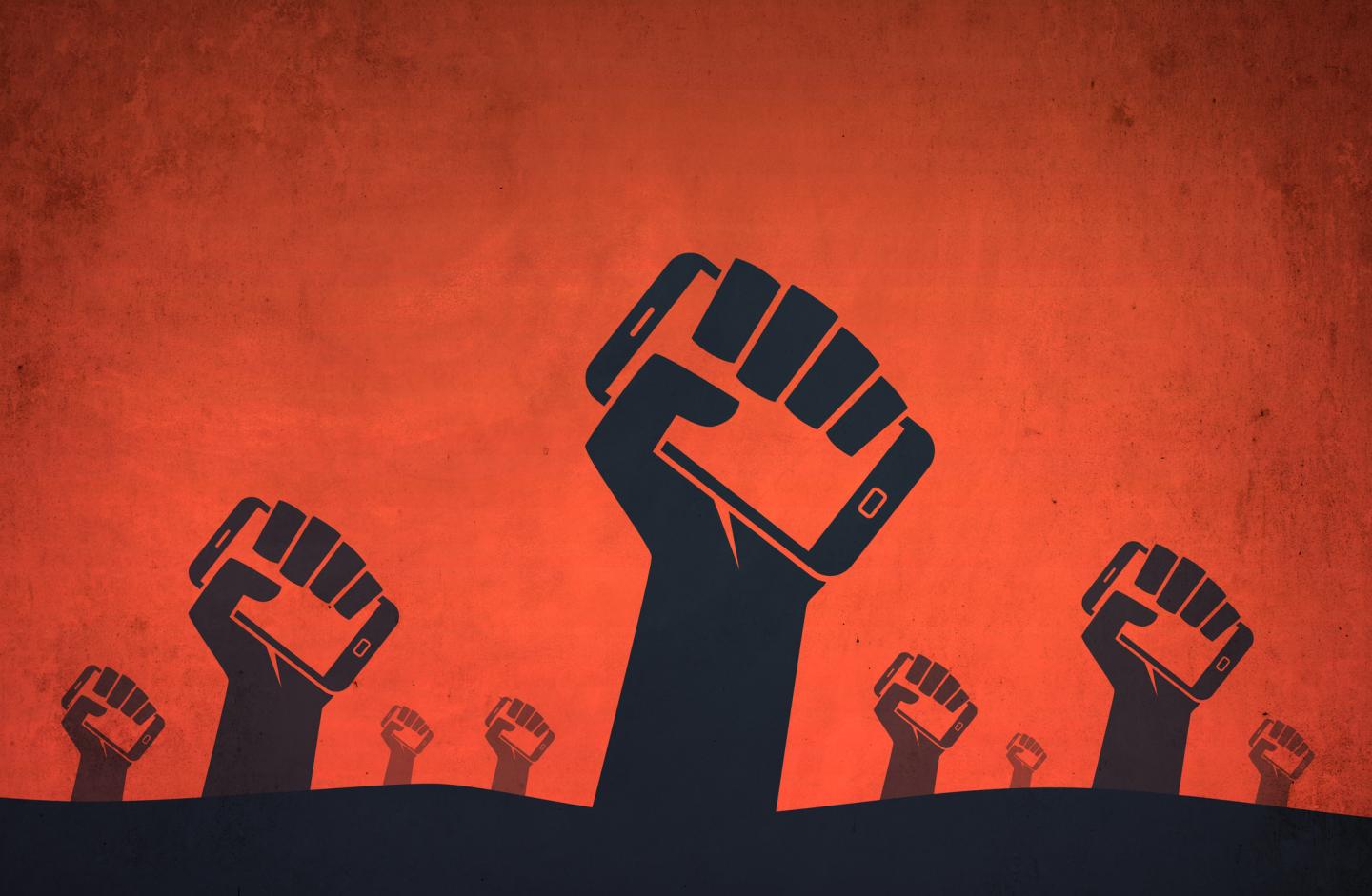 Photo illustration of revolutionary fists in the air holding smart phones.