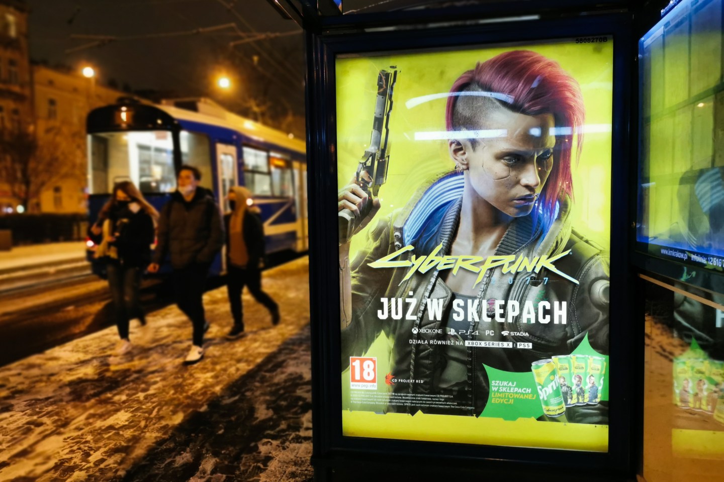 City light poster advertising video game Cyberpunk 2077 in Krakow, Poland.