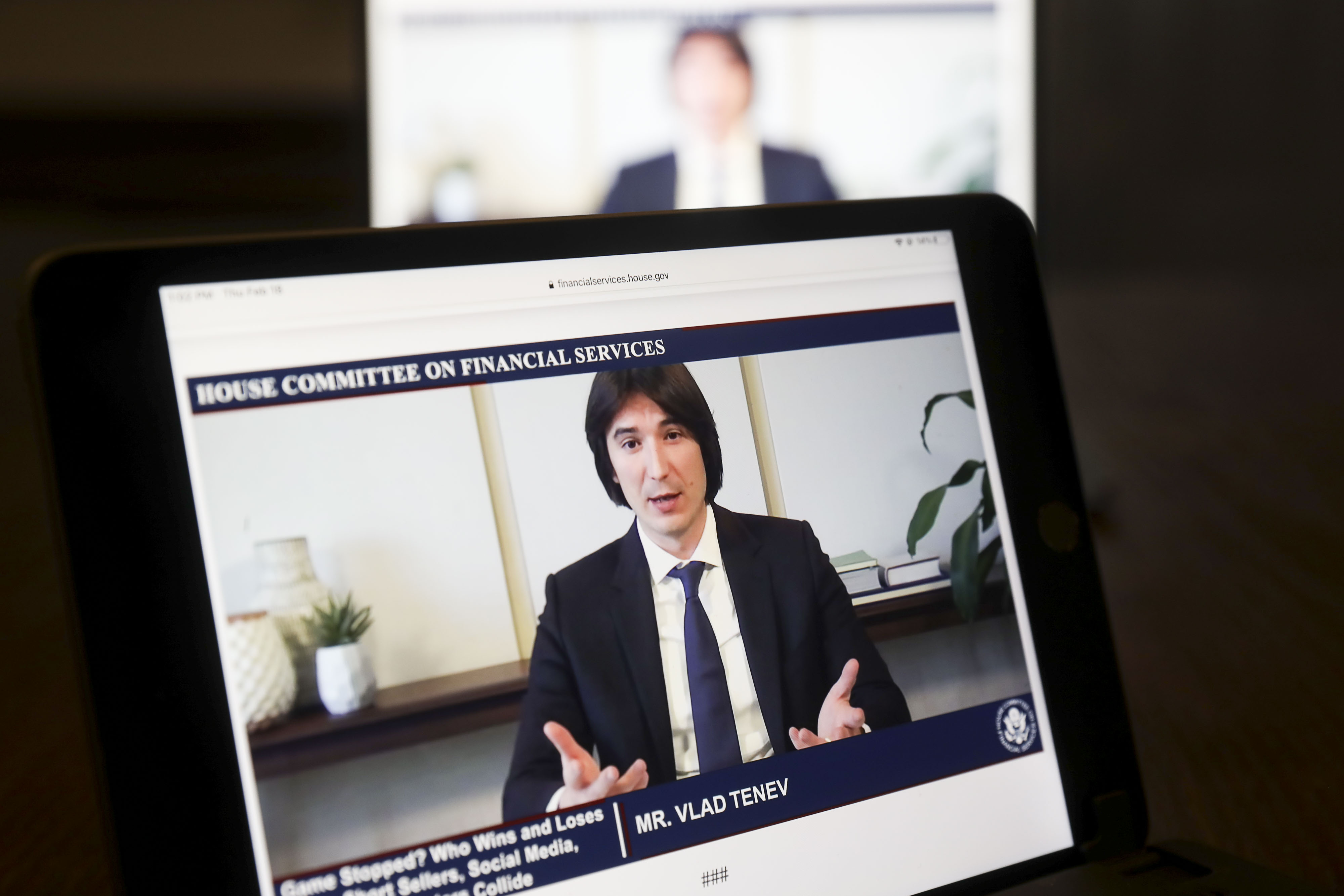 Vlad Tenev, chief executive officer and co-founder of Robinhood Markets Inc., speaks virtually during a House Financial Services Committee hearing on a laptop computer in Tiskilwa, Illinois, U.S., on Thursday, Feb. 18, 2021. Robinhood Markets and Citadel, central players in the GameStop Corp. saga that riveted markets last month plan to deliver a unified message to U.S. lawmakers that conspiracies swirling in Washington, that they worked together to harm retail investors are categorically false. 