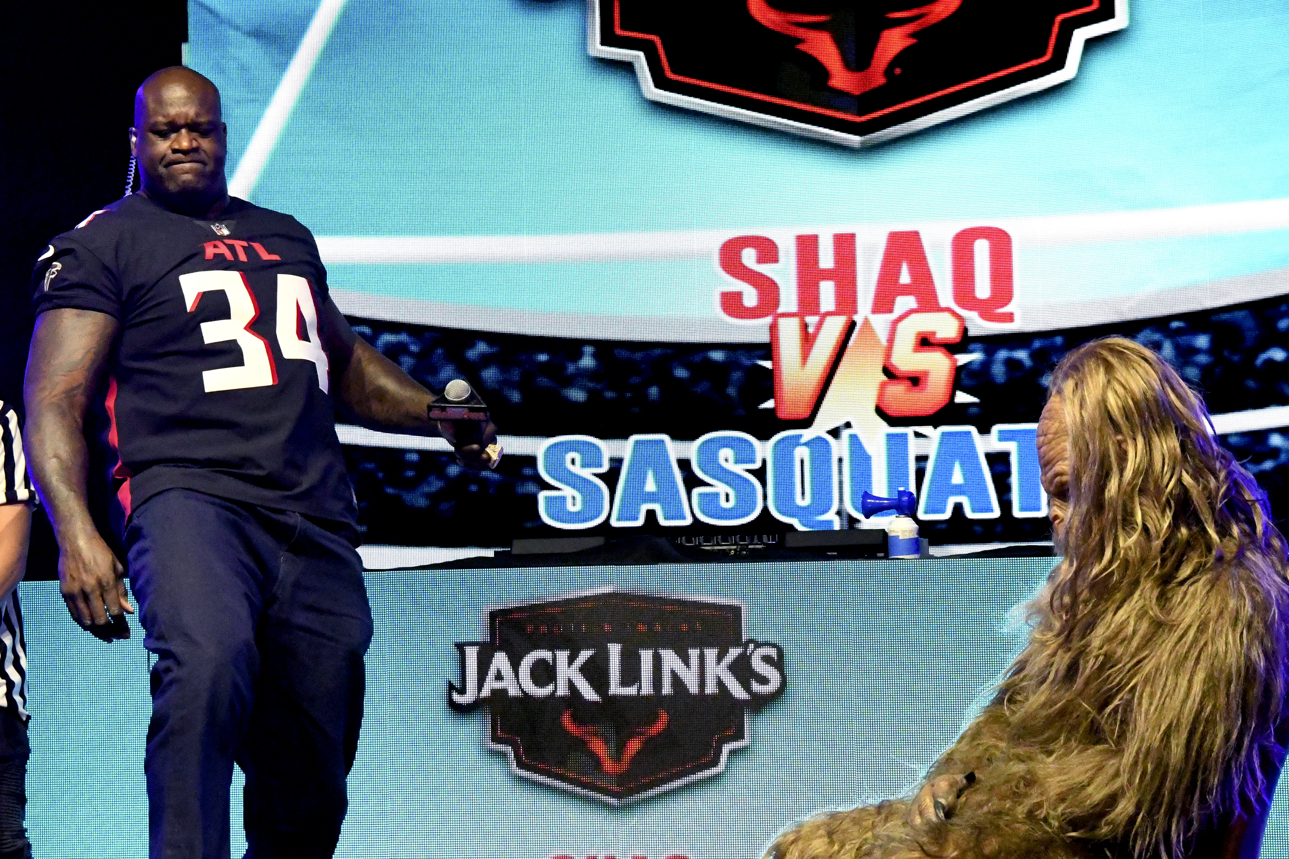 Shaquille O’Neal and Sasquatch participate in a celebrity challenge at The SHAQ Bowl for Super Bowl LV on February 07, 2021 in Tampa, Florida. Never mind that. The NBA star is looking to raise a $250 million fund to spawn a series of SPAC investments. Wire photo by Gerardo Mora—Getty Images