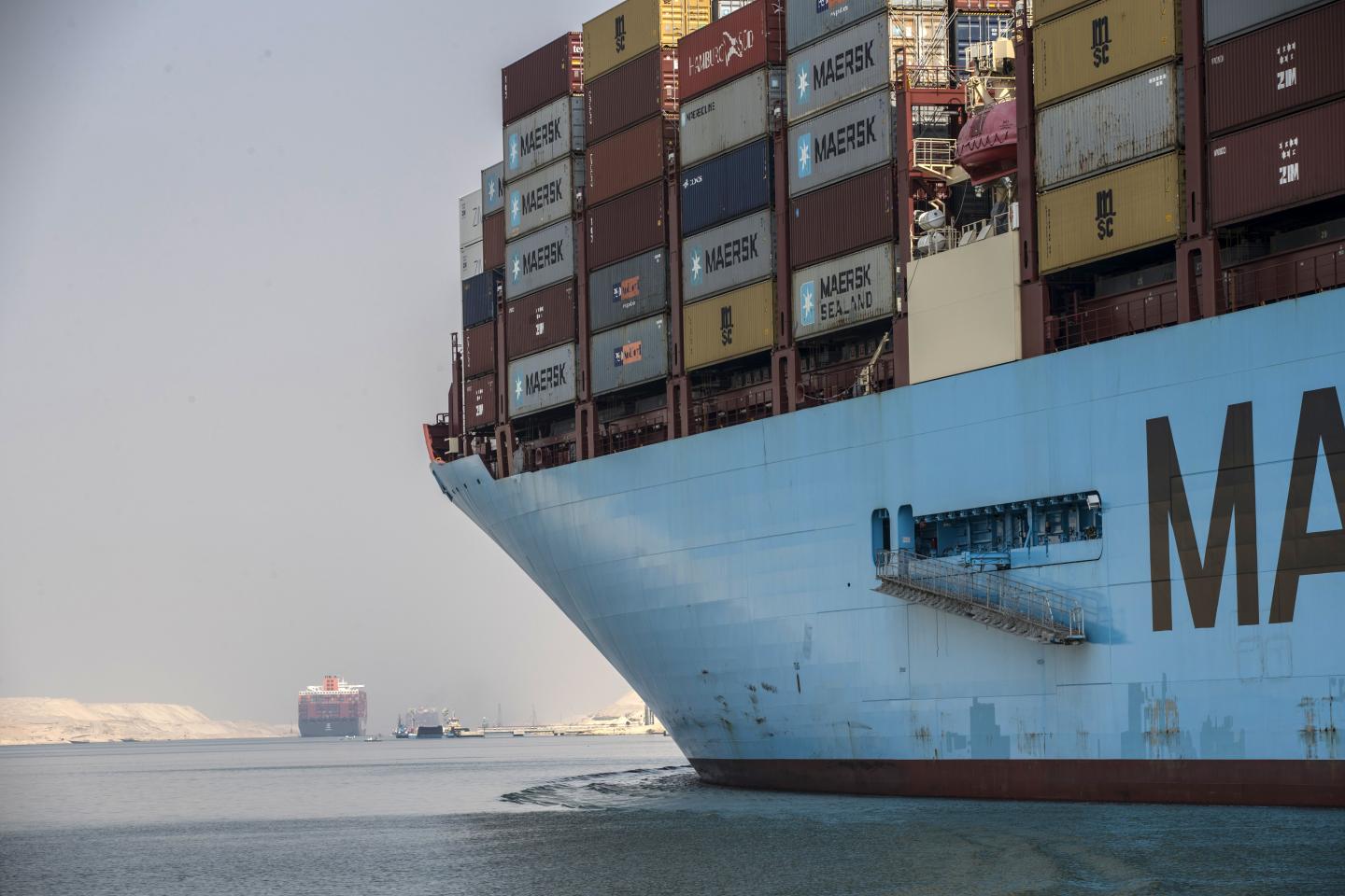 A ship longer than the Eiffel Tower runs aground in Suez Canal, roiling global trade