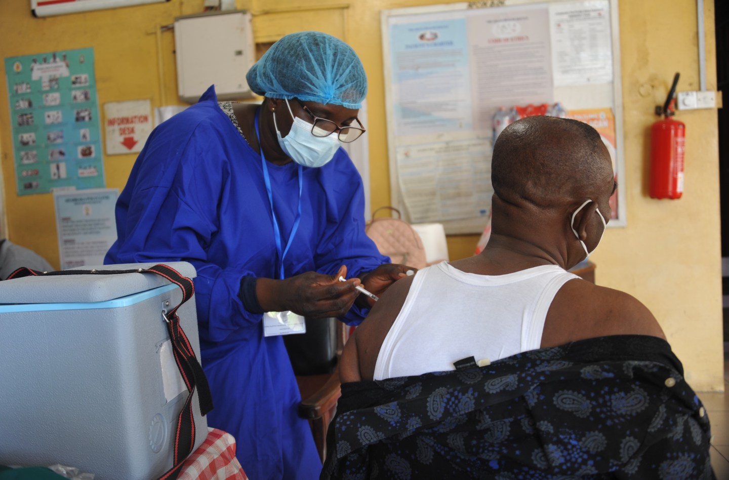 A nurse administers a COVID-19 vaccine at a hospital in Accra, Ghana, as part of the Covax effort to distribute vaccines in the developing world. “Until the whole world is vaccinated, the whole world will be at risk,” writes Rajiv Shah.