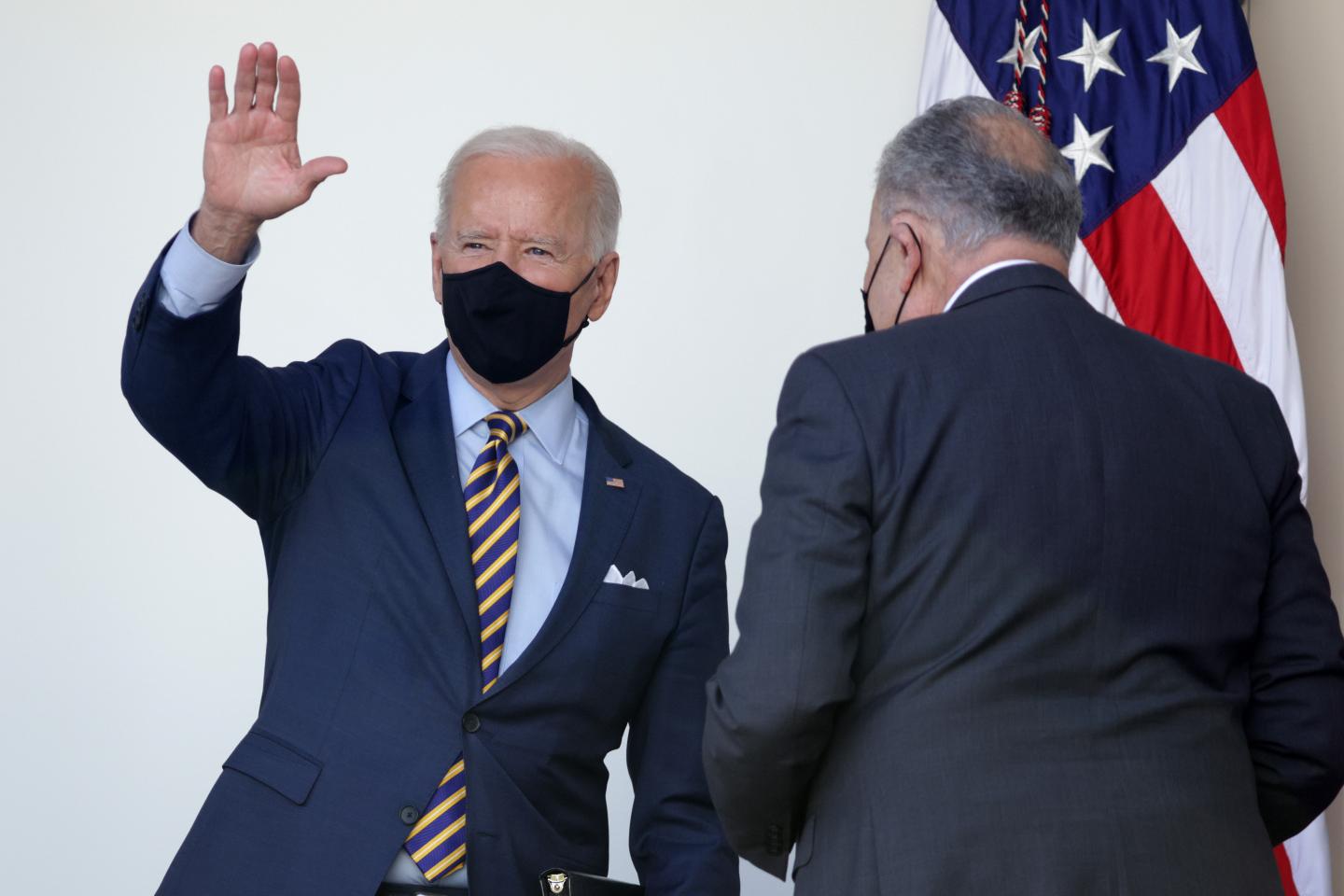 U.S. President Joe Biden waves during an event on the American Rescue Plan in the Rose Garden of the White House on March 12, 2021 in Washington, DC.