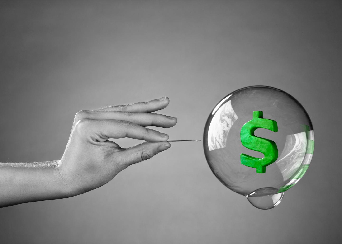Can the stock market crash during an economic boom?