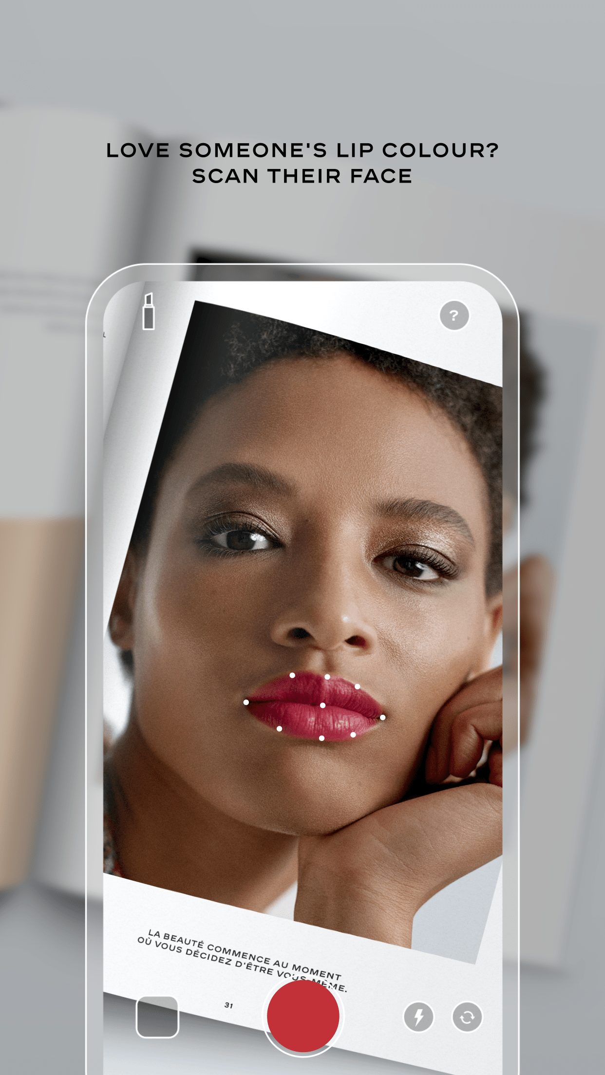 A photo of Chanel's new Lipscanner iphone app being used.