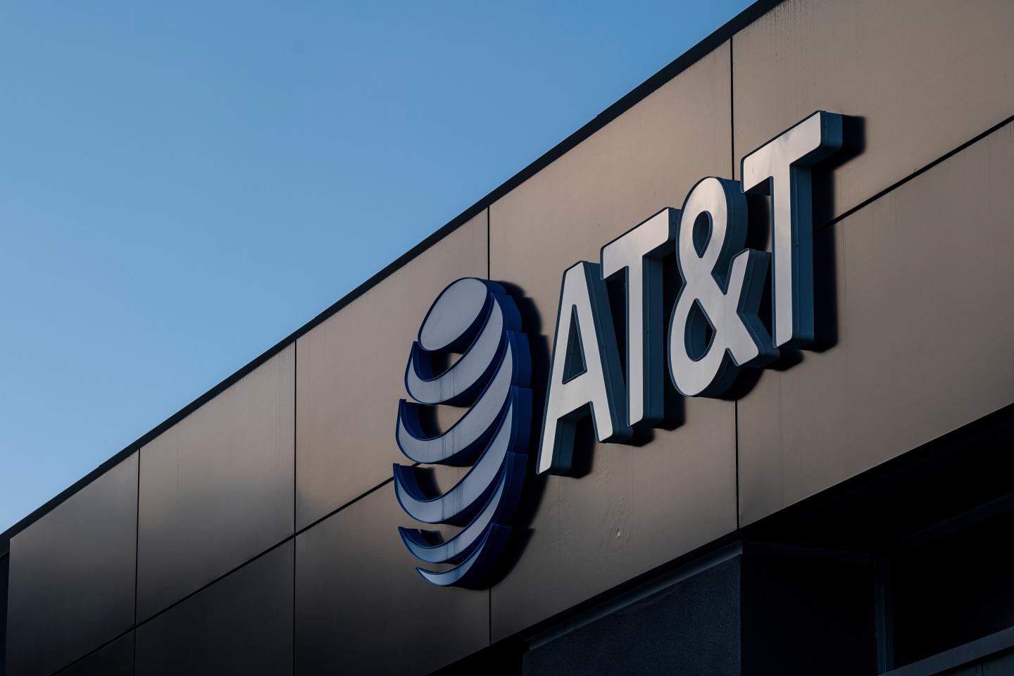 Signage on an AT&amp;T store in Daly City, California, U.S., on Monday, Jan. 25, 2021.