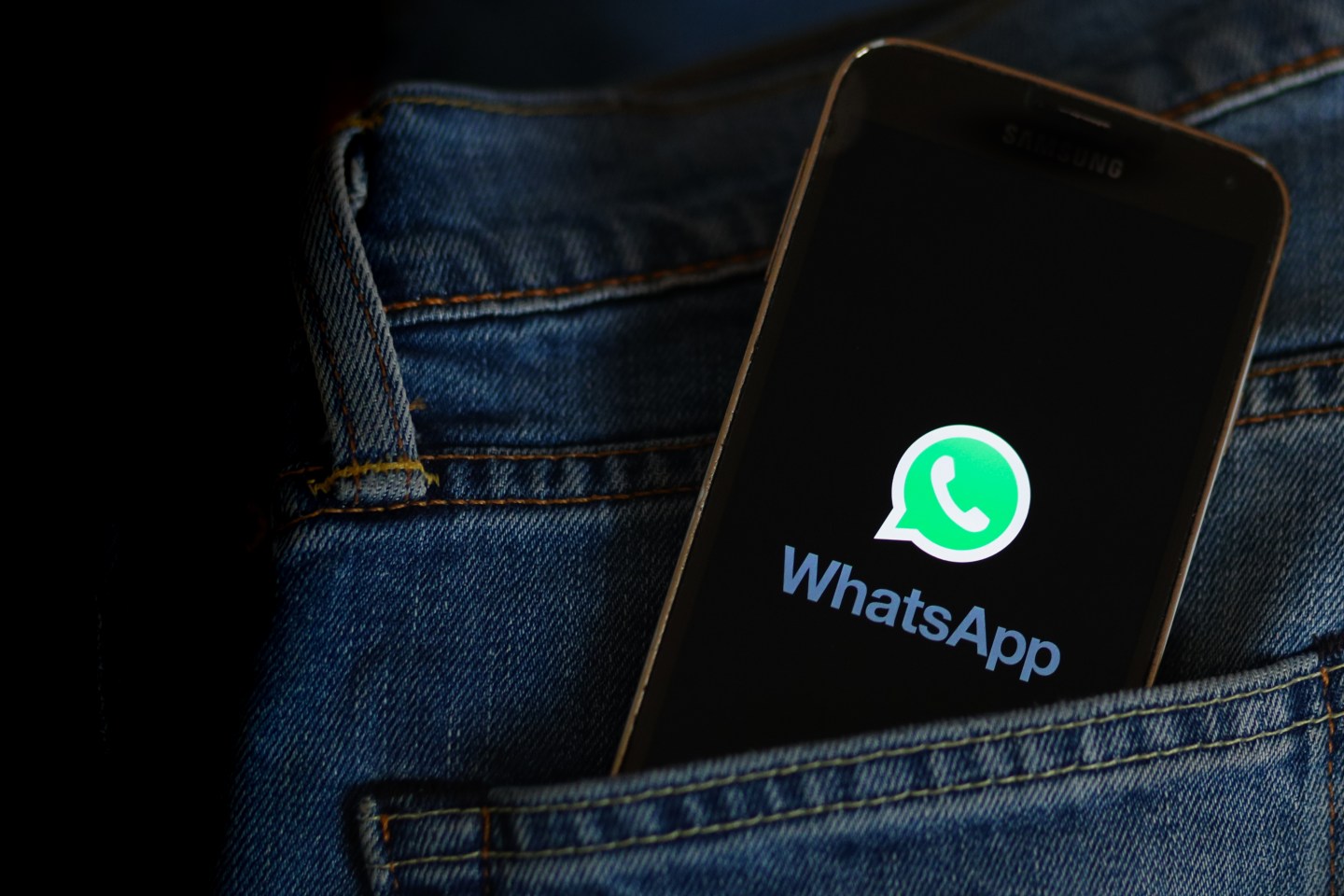In this photo illustration, a Whatsapp online communicator logo seen displayed on a smartphone.