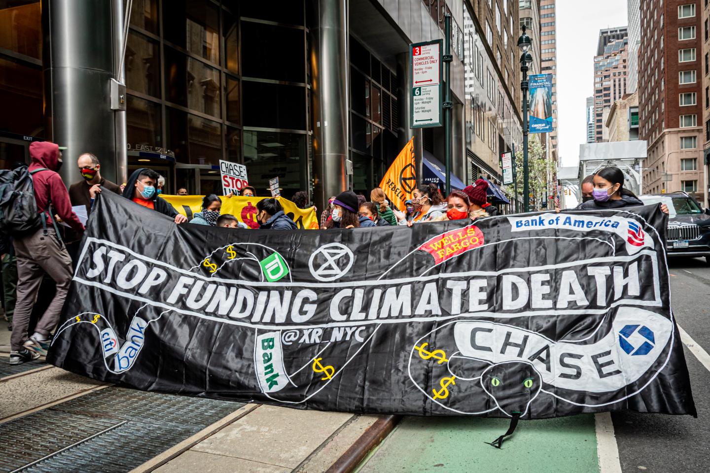 Climate activists with Stop the Money Pipeline held a rally in midtown Manhattan first at BlackRocks HQ and then march to JP Morgan Chase HQ, -two of the worlds biggest funders of climate destruction in their opinion- to urge the two companies to end their support for the dangerous proposed Line 3 pipeline project, and stop funding fossil fuels and forest destruction.