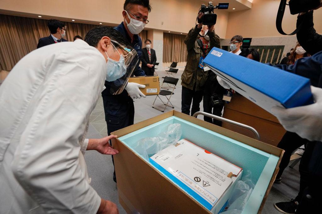 Japan has money, manufacturing might, and the Olympics looming. Why is its vaccine rollout so far behind?