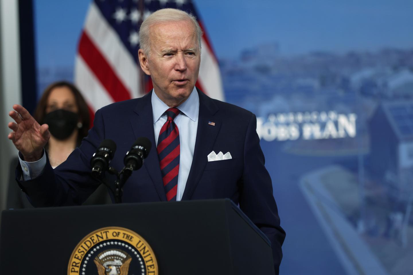 U.S. President Joe Biden speaks as Vice President Kamala Harris listens during an event at the South Court Auditorium at Eisenhower Executive Office Building April 7, 2021 in Washington DC.