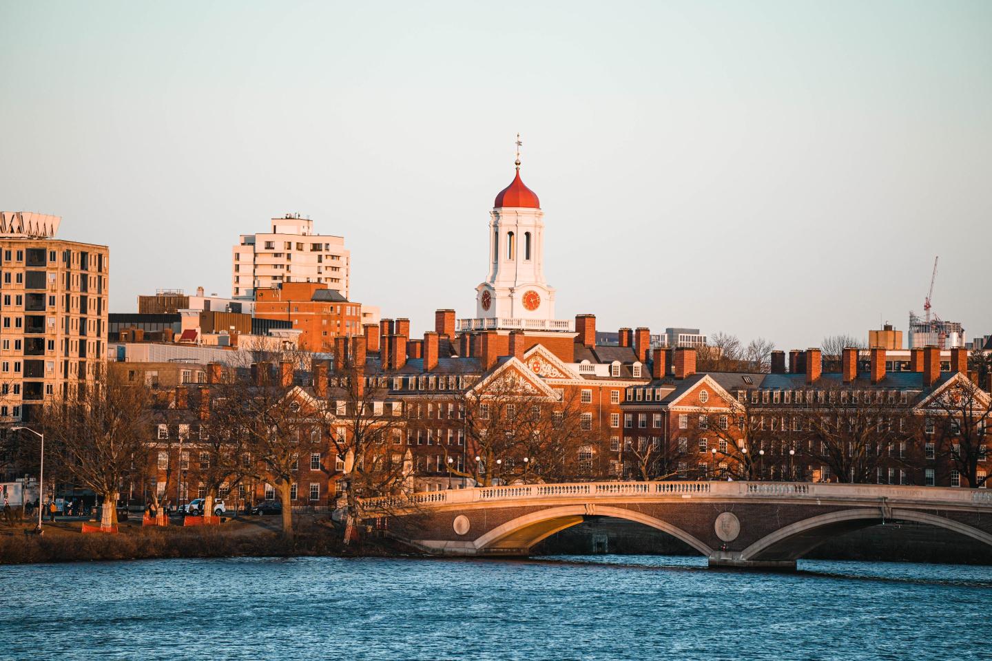 Panorama of Harvard University from across a river.