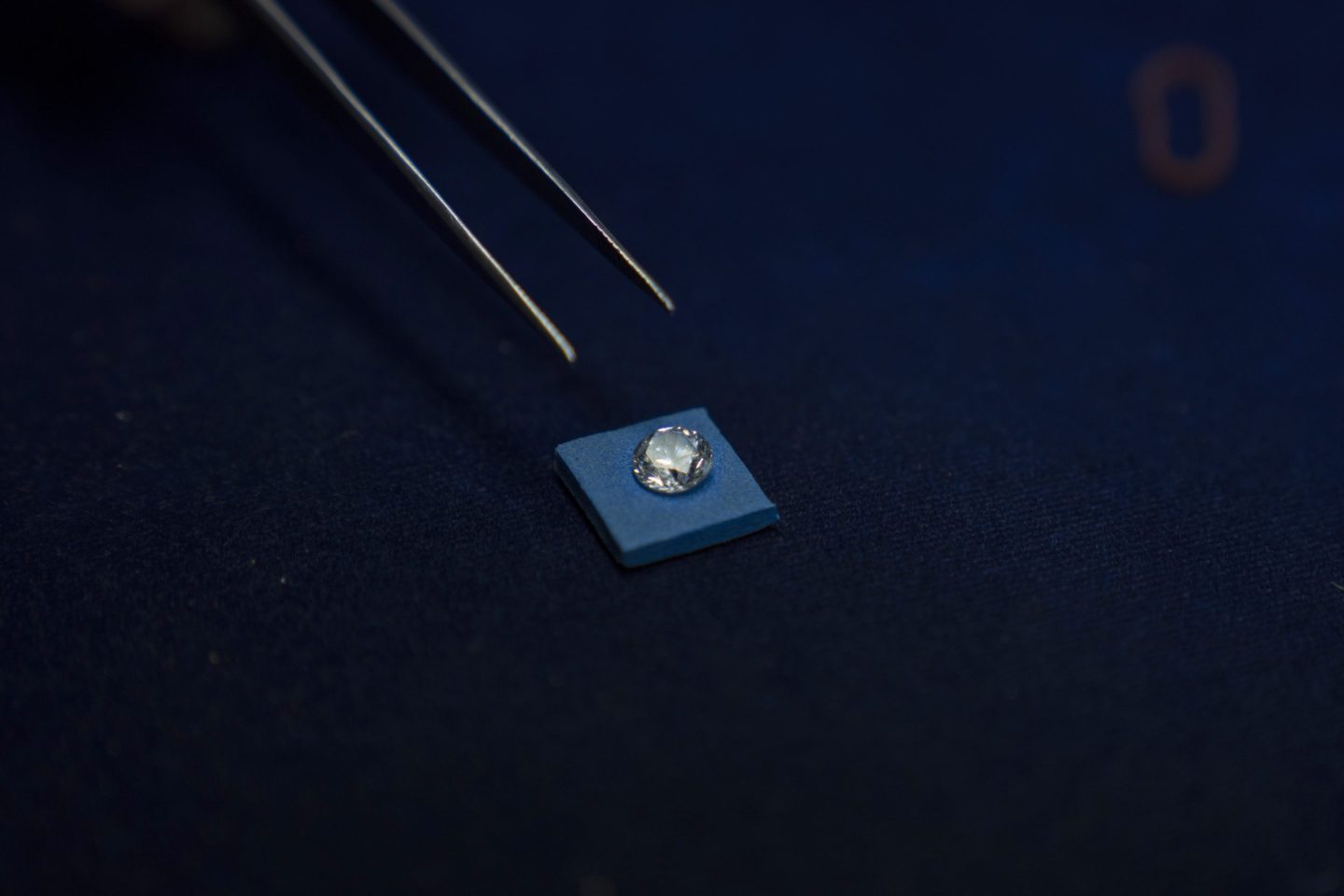 Worker prepares to pick up a diamond