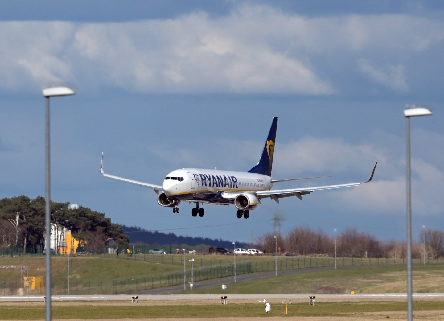 03 April 2021, Brandenburg, Schönefeld: One Boeing 737-8AS of the airline Ryanair with the registration 9H-QED landing from Fuerteventura (Spain) on the southern runway of Berlin Brandenburg Airport "Willy Brandt".