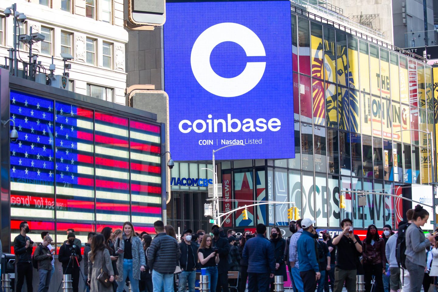 Monitors display Coinbase signage