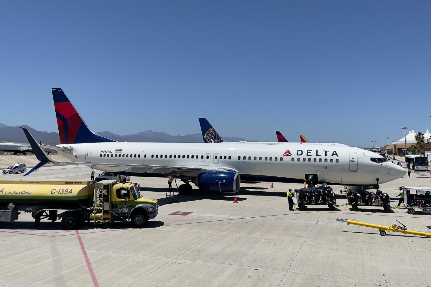 Delta will require new employees to get vaccinated as demand for domestic air travel returns