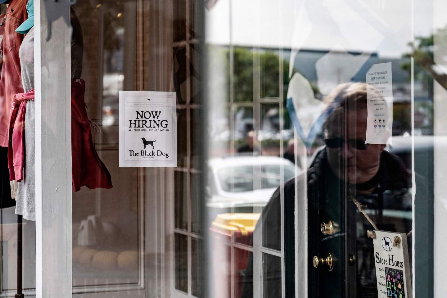 A clothing store advertises that they are hiring in Annapolis, Maryland on May 12, 2021.