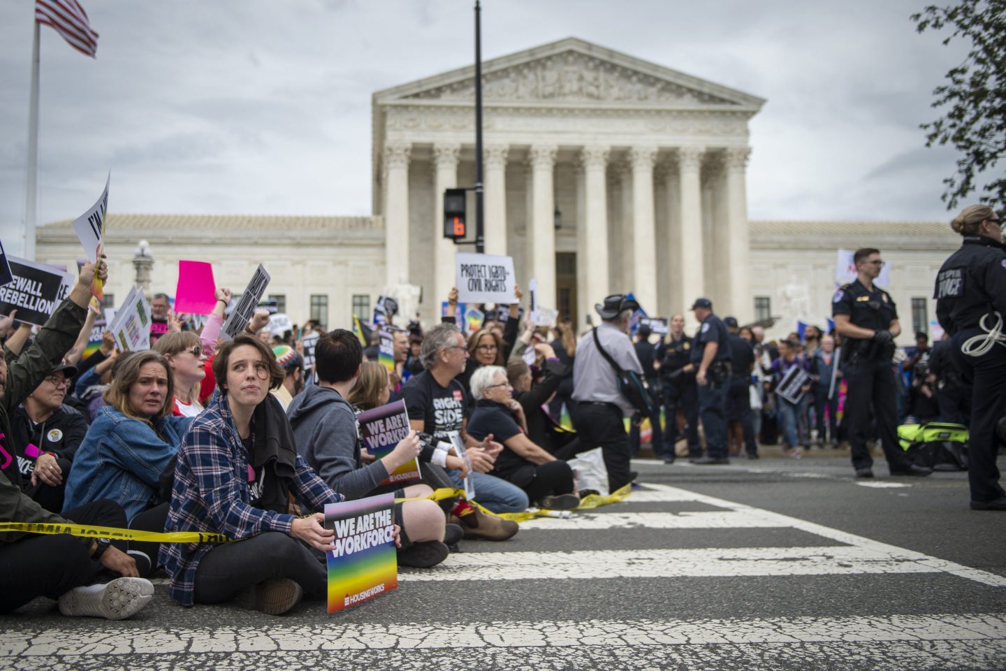 Protesters block the street in front of the Supreme Court as it hears arguments on whether gay and transgender people are covered by a federal law barring employment discrimination on the basis of sex on Oct. 8, 2019.