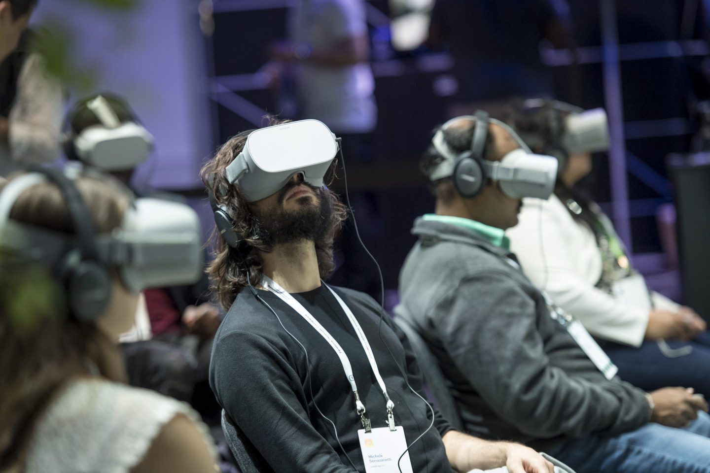 Attendees use Oculus VR at the F8 Developer's Conference