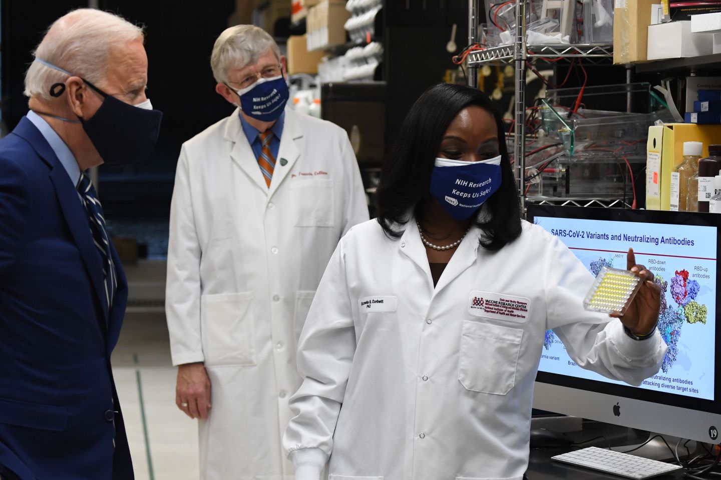 President Biden listens to Dr. Kizzmekia S. Corbett (right) as he tours the Viral Pathogenesis Laboratory at the National Institutes of Health (NIH). The NIH is “the very fuel that feeds the American engine of medical discovery and the linchpin to our country’s post-COVID economic recovery,” writes Dr. Gary K. Michelson.