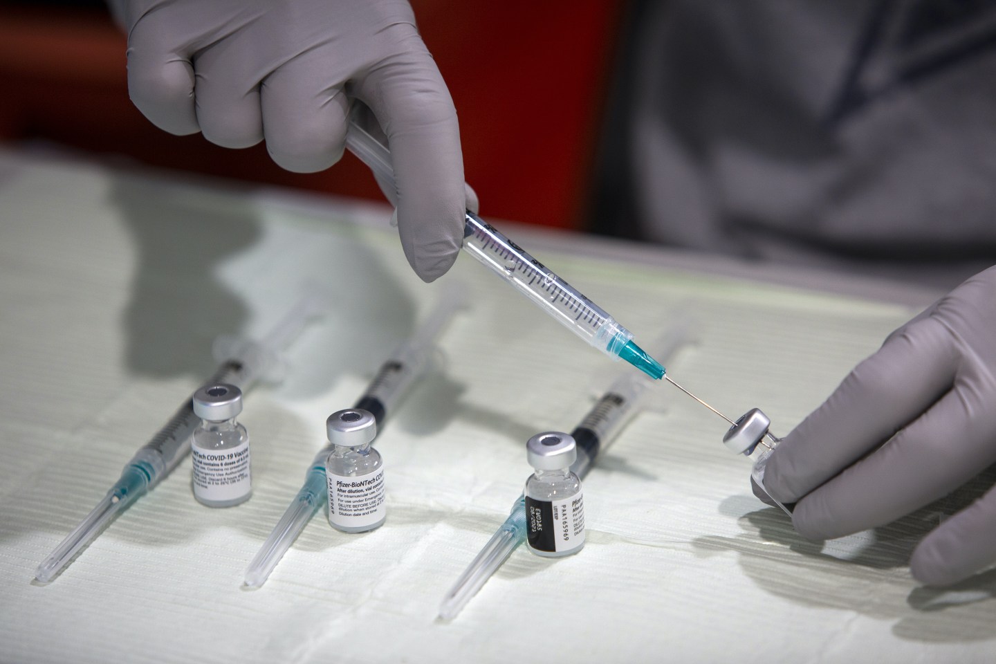 Healthcare Workers Administer Covid-19 Vaccines At Airport As U.S. Daily Cases Hit 14-Month Low