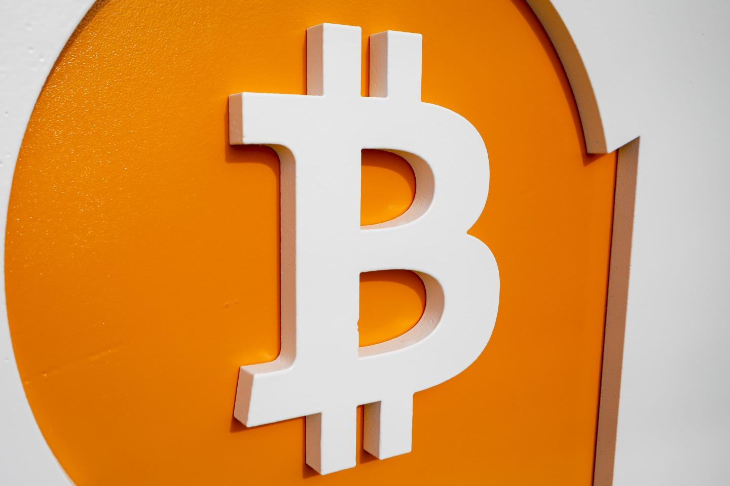 Bitcoin tumbles, futures flatline as investors press pause on the earnings-led rally