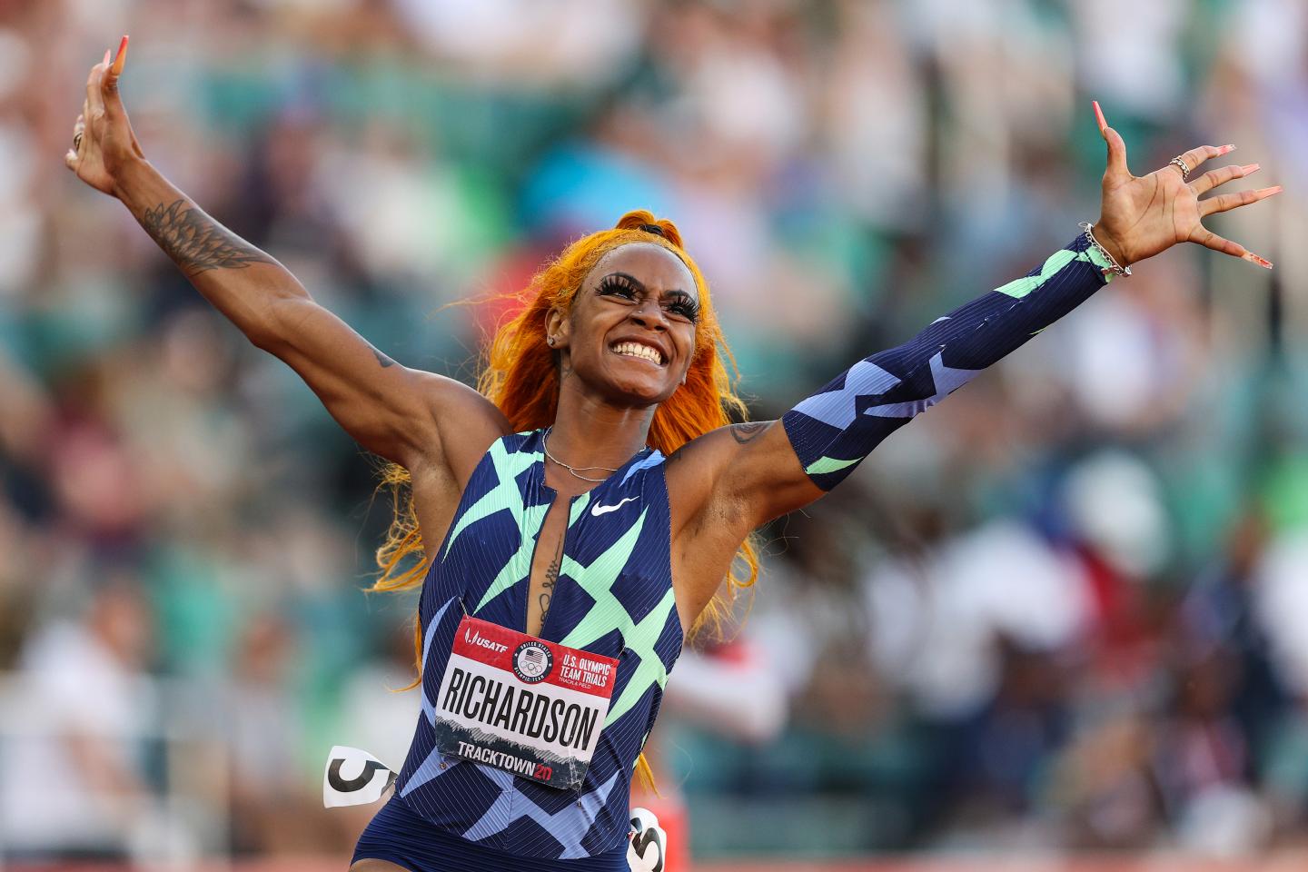 Sha'Carri Richardson pictured celebrating after winning the Women's 100 Meter final.