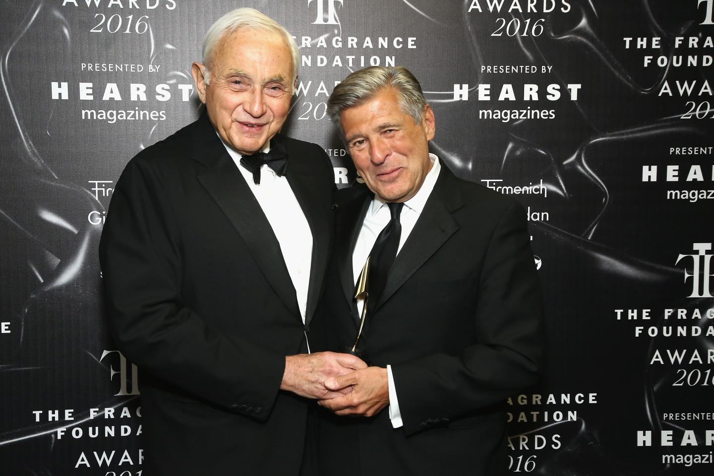 Les Wexner and Ed Razek pose backstage at the 2016 Fragrance Foundation Awards presented by Hearst Magazines - Show on June 7, 2016 in New York City.
