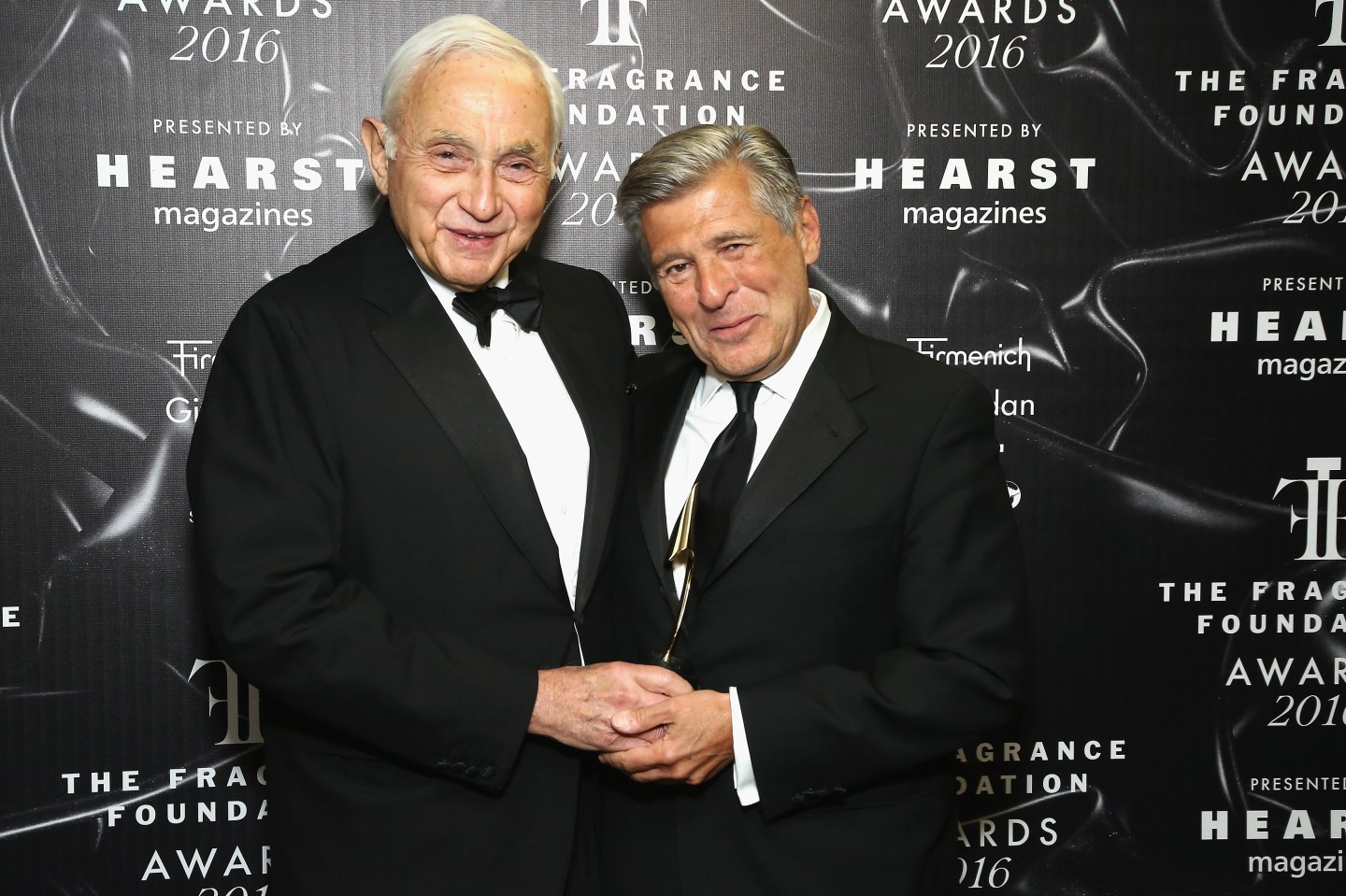 Les Wexner and Ed Razek pose backstage at the 2016 Fragrance Foundation Awards presented by Hearst Magazines - Show on June 7, 2016 in New York City.