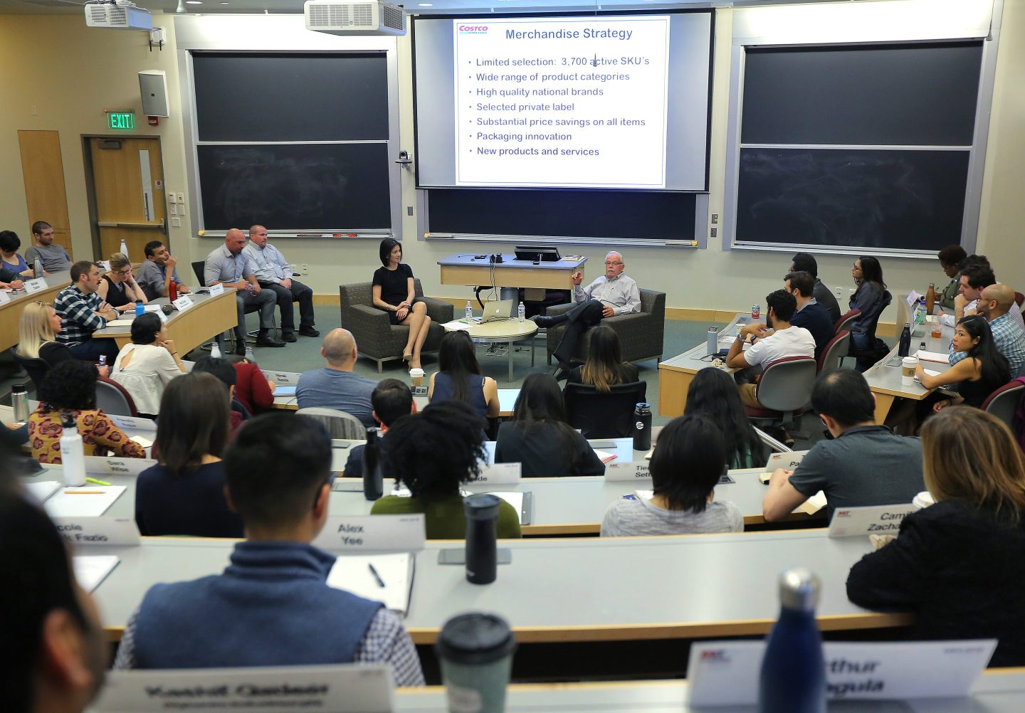Students sit in a lecture hall at the MIT Sloan School of Management.