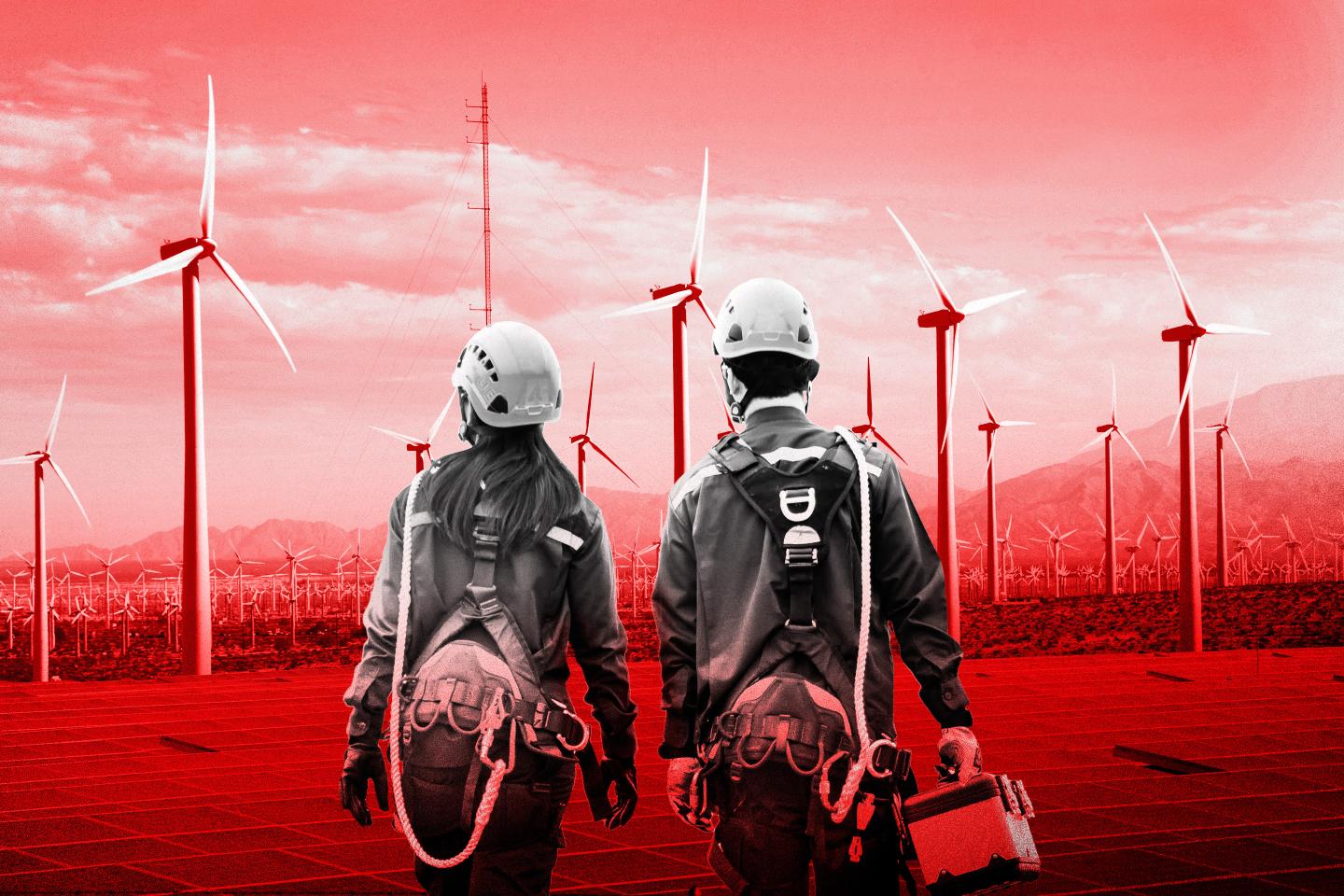 engineers wearing Personal protective equipment working in wind turbine farm