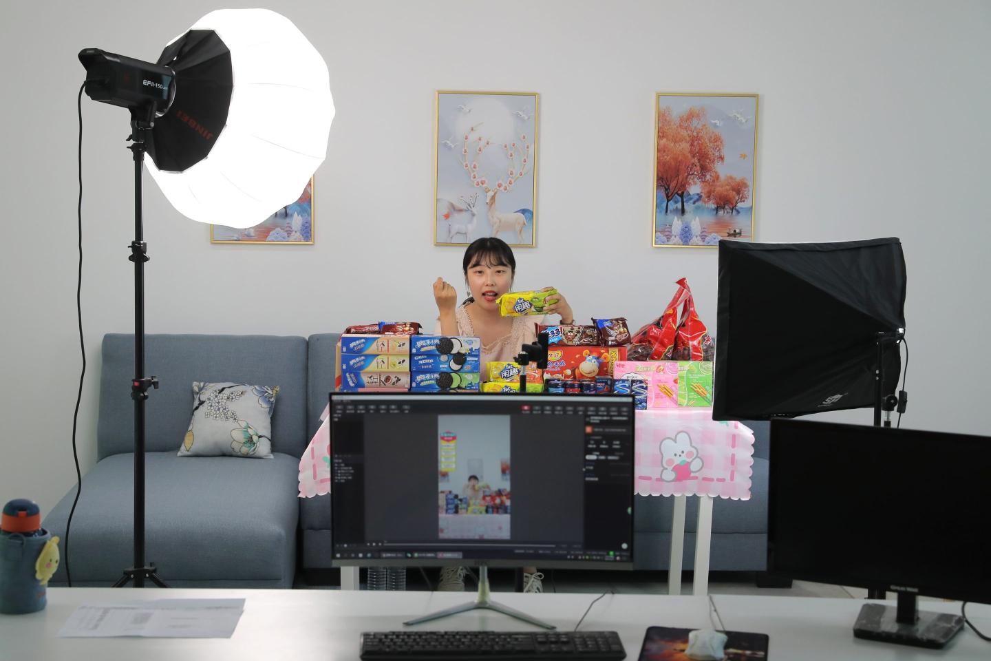A livestreamer sells biscuits in Tianjin, China on May 21, 2021.