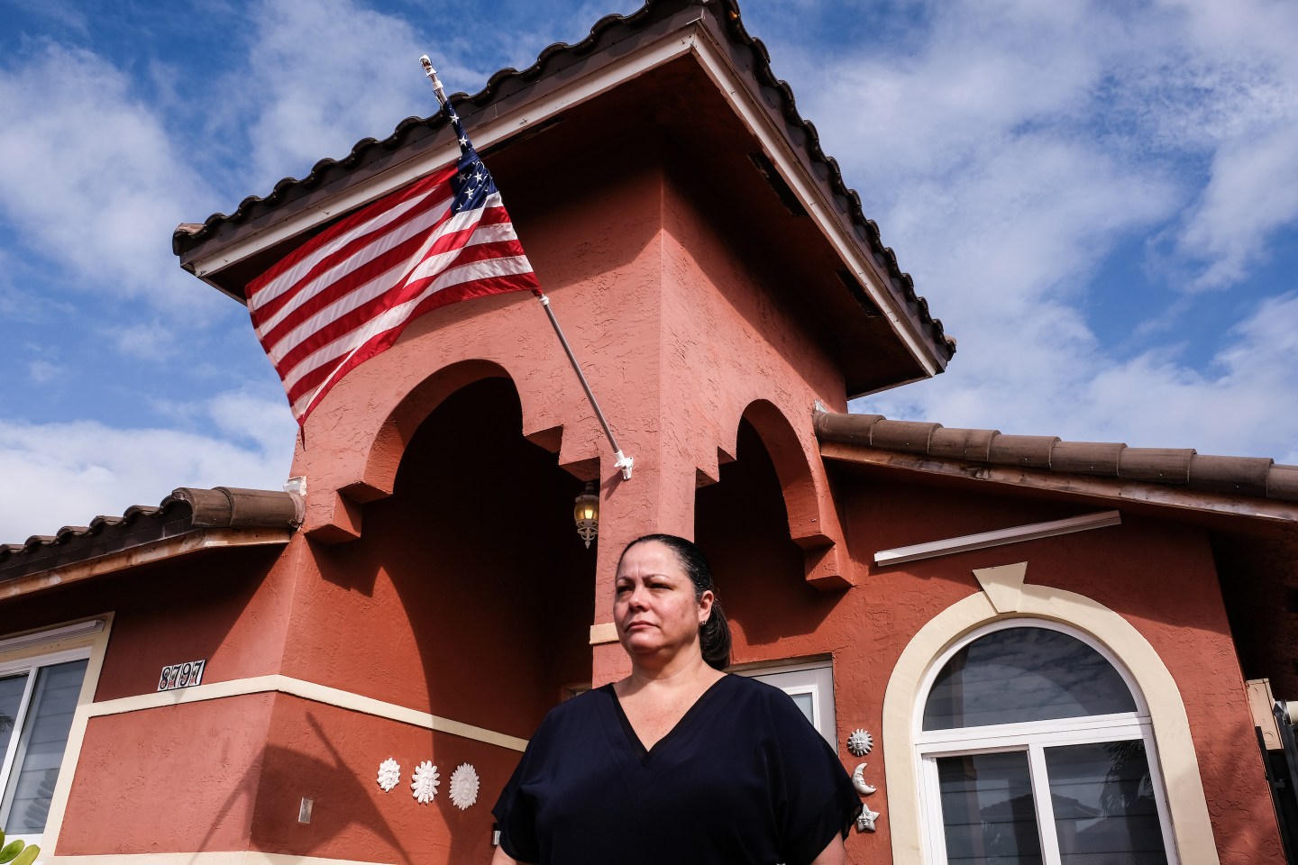 Nancy Lazo of Hialeah Gardens, Florida, is suing Dr. Kingsley Chin, whose company’s screw implant caused nerve damage, her lawyers allege. (Maria Alejandra Cardona for KHN)