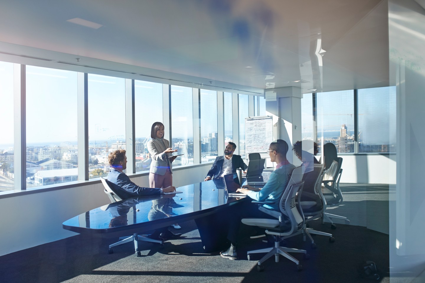Modern chic business people working in an incredible futuristic &amp; original office space