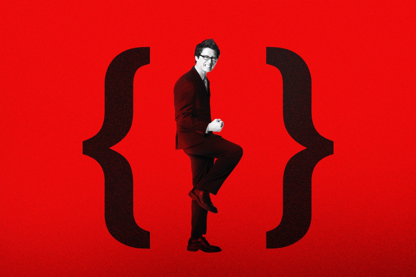 man in suit emoting excitedly on red background standing between two parentheses