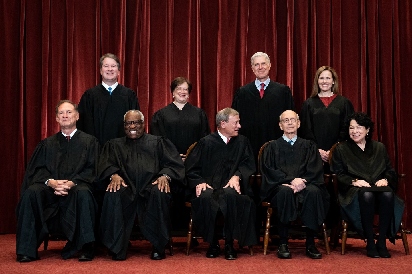 Members of the Supreme Court pose for a group photo at the Supreme Court in Washington, DC on April 23, 2021.