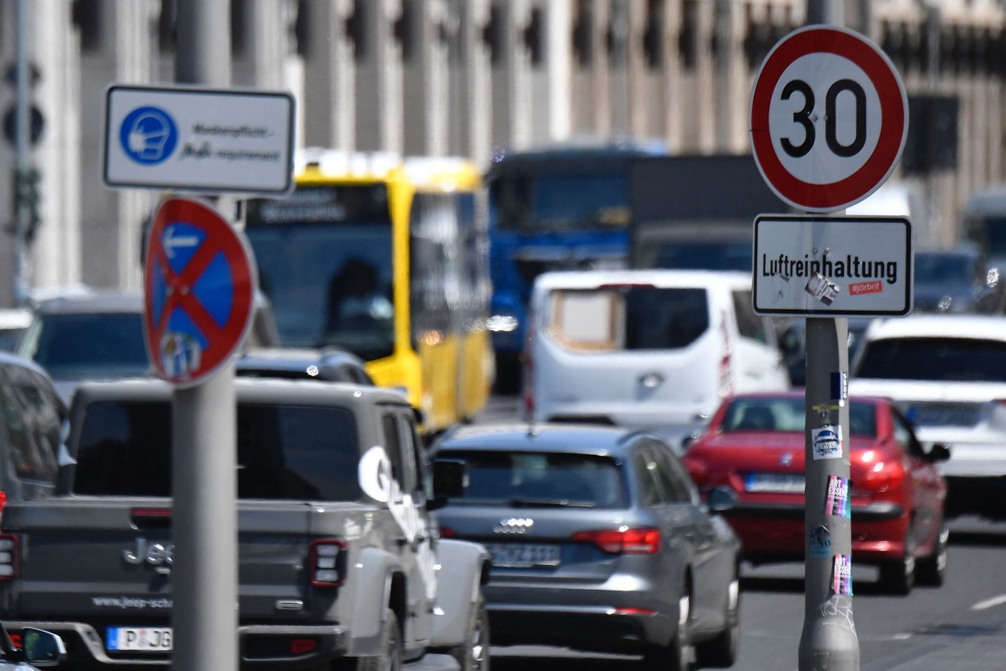 A traffic sign indicates the speed limit in order to improve air quality in a street in Berlin's Mitte district on June 3, 2021