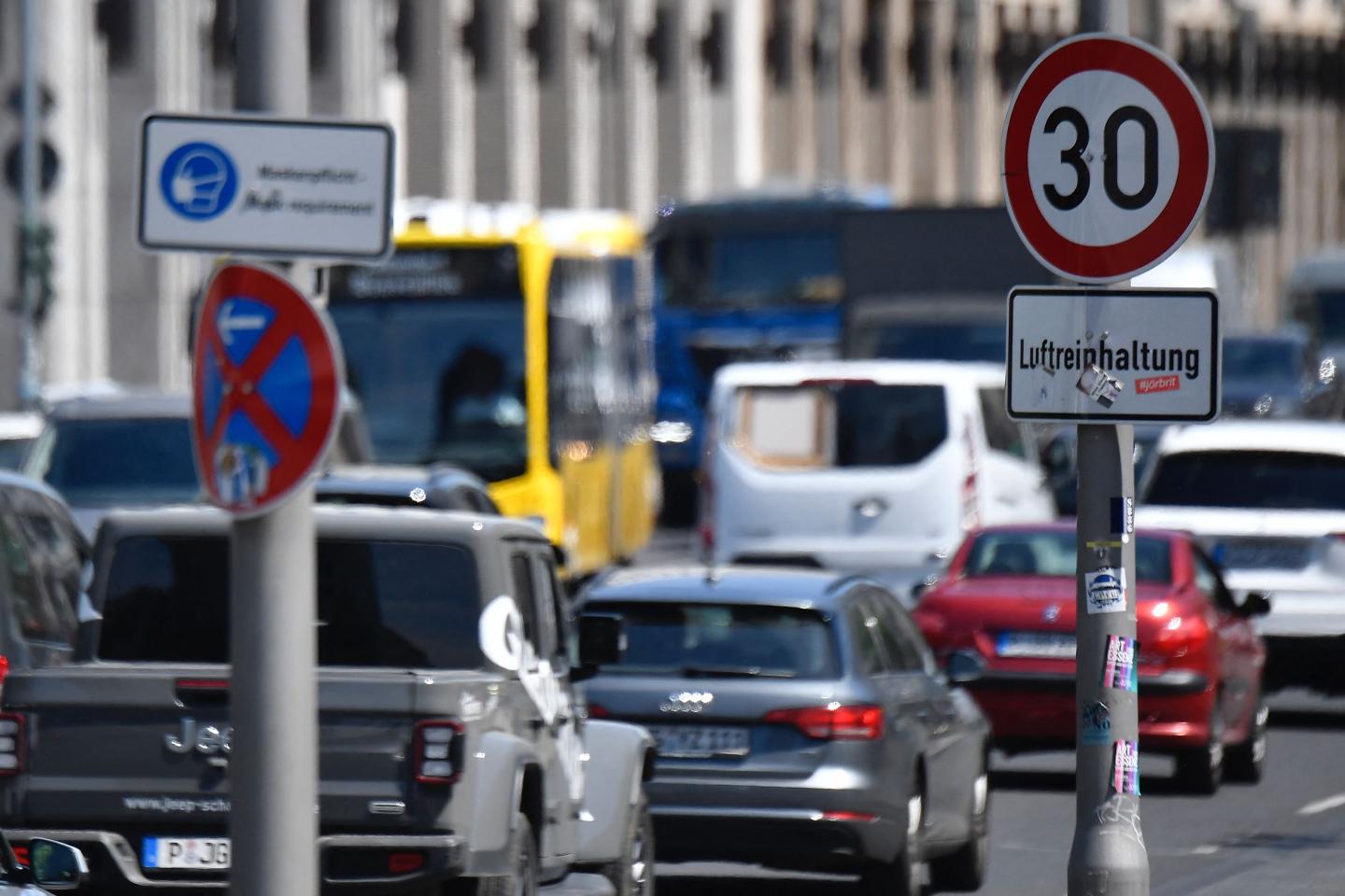 A traffic sign indicates the speed limit in order to improve air quality in a street in Berlin's Mitte district on June 3, 2021