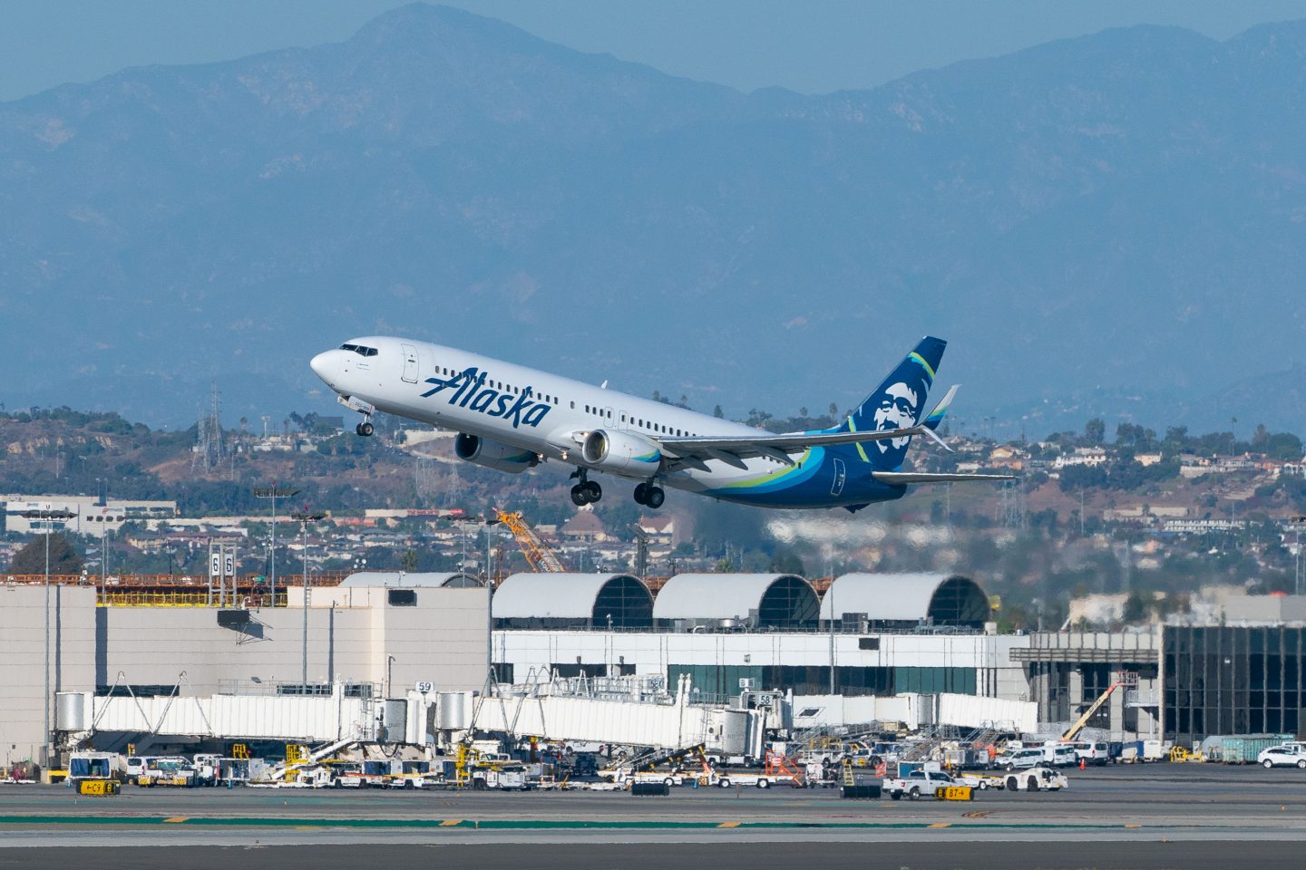 Alaska Airlines plane taking off from Los Angeles airport
