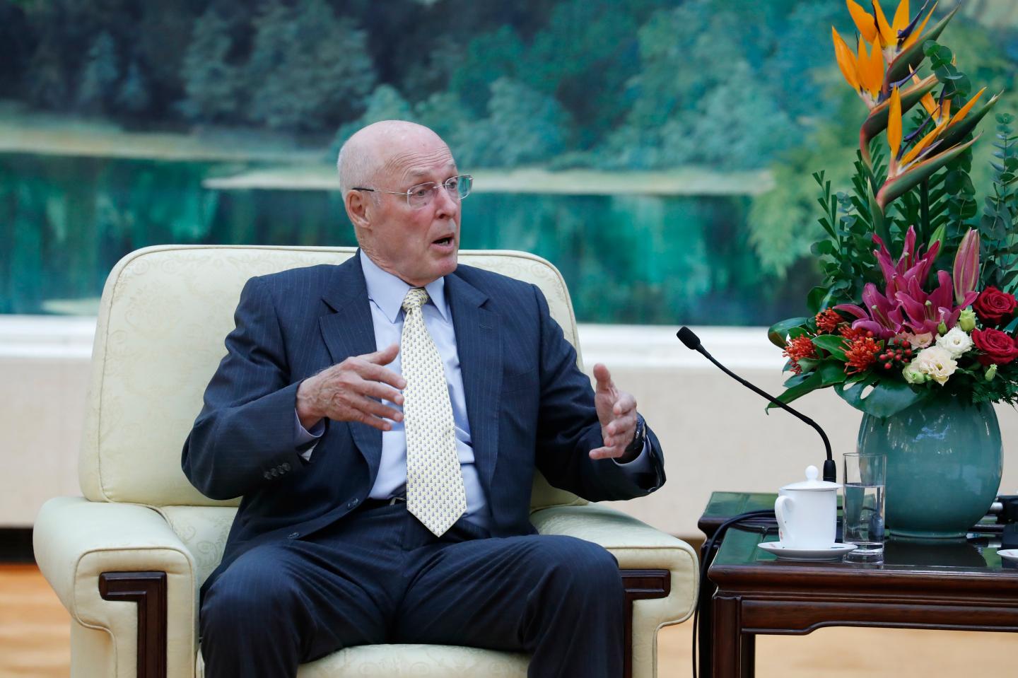 Former Treasury Secretary Henry Paulson speaks during a meeting with Chinese Premier Li Keqiang at the Great Hall of the People in Beijing on October 23, 2019.