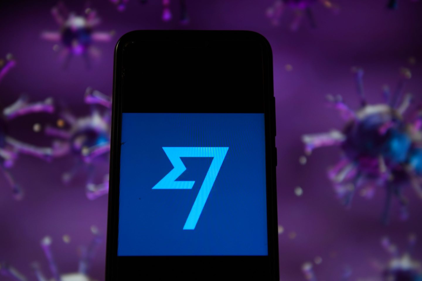 In this photo illustration a TransferWise logo displayed on