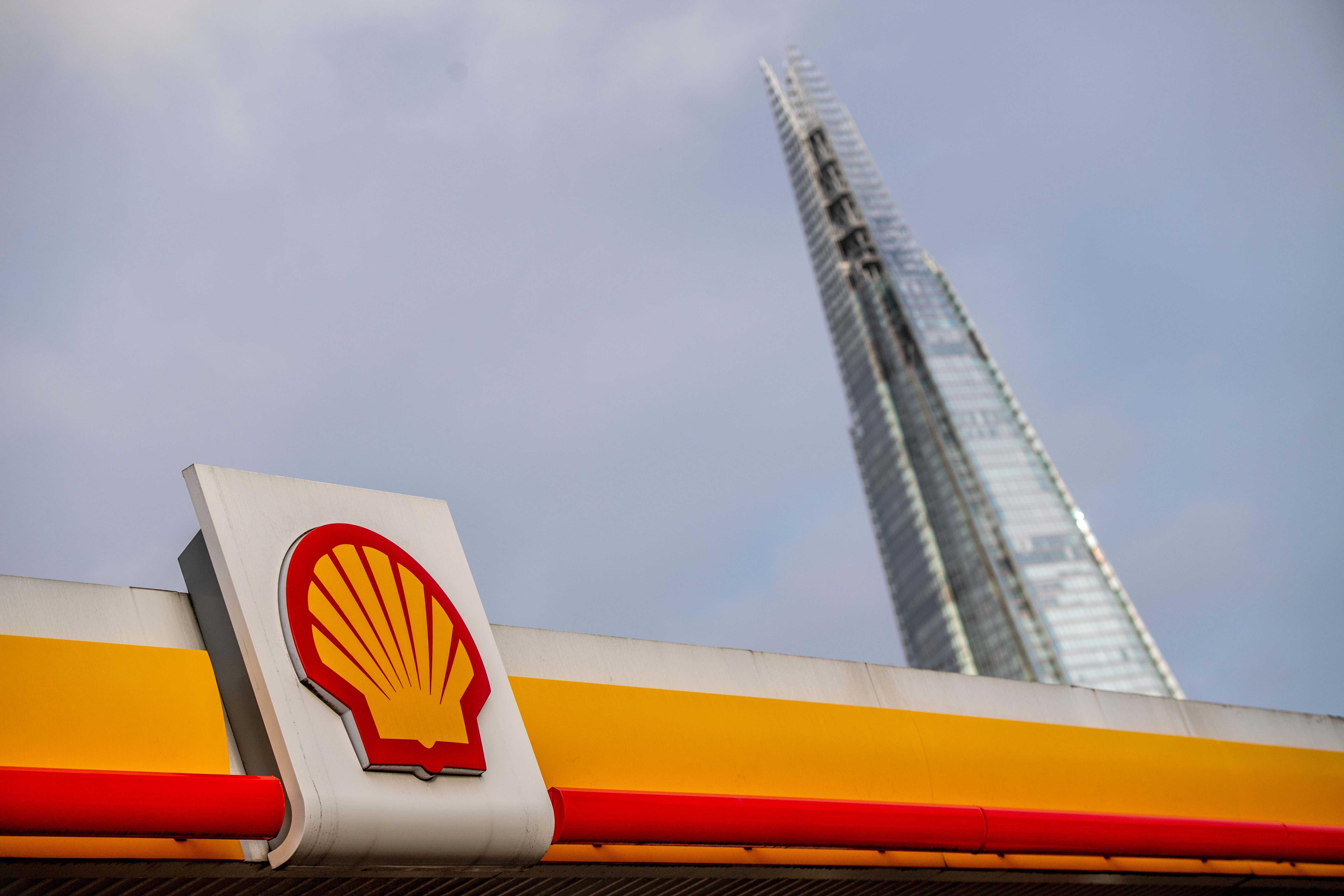 A Royal Dutch Shell petrol station in view of the Shard skyscraper in London, February 2021.