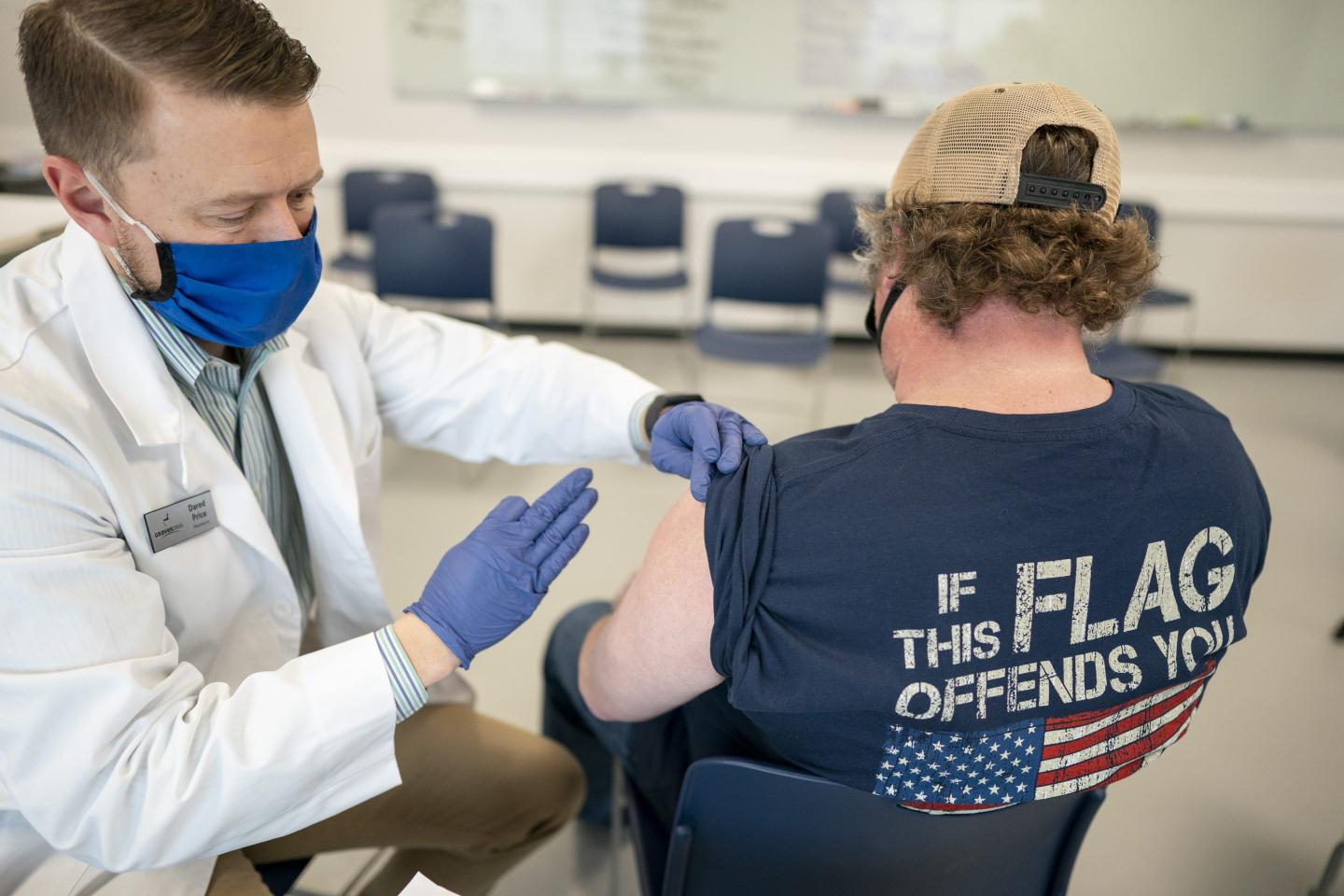 The U.S. COVID surge may be convincing some vaccine-hesitant Americans to get the shot