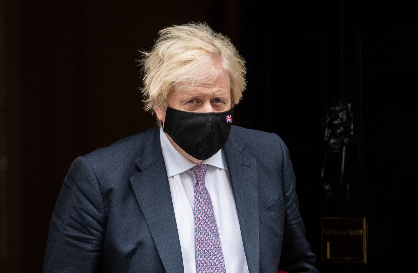 U.K. Prime Minister, Boris Johnson leaves Downing Street to attend Prime Ministers Questions at the Houses of Parliament on July 7, 2021 in London, England.