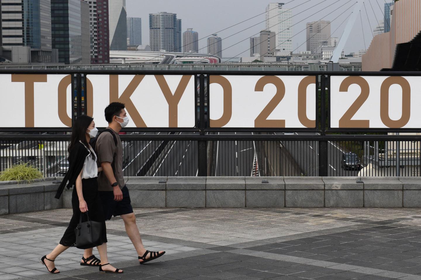 Tokyo Olympics will go on without fans as Japan declares state of emergency