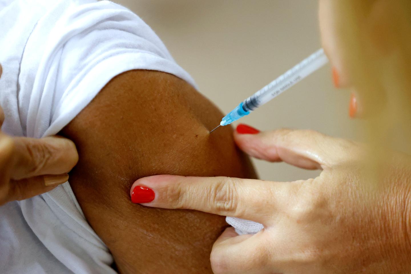 Israel says booster shots are not for everyone amid rise in COVID cases