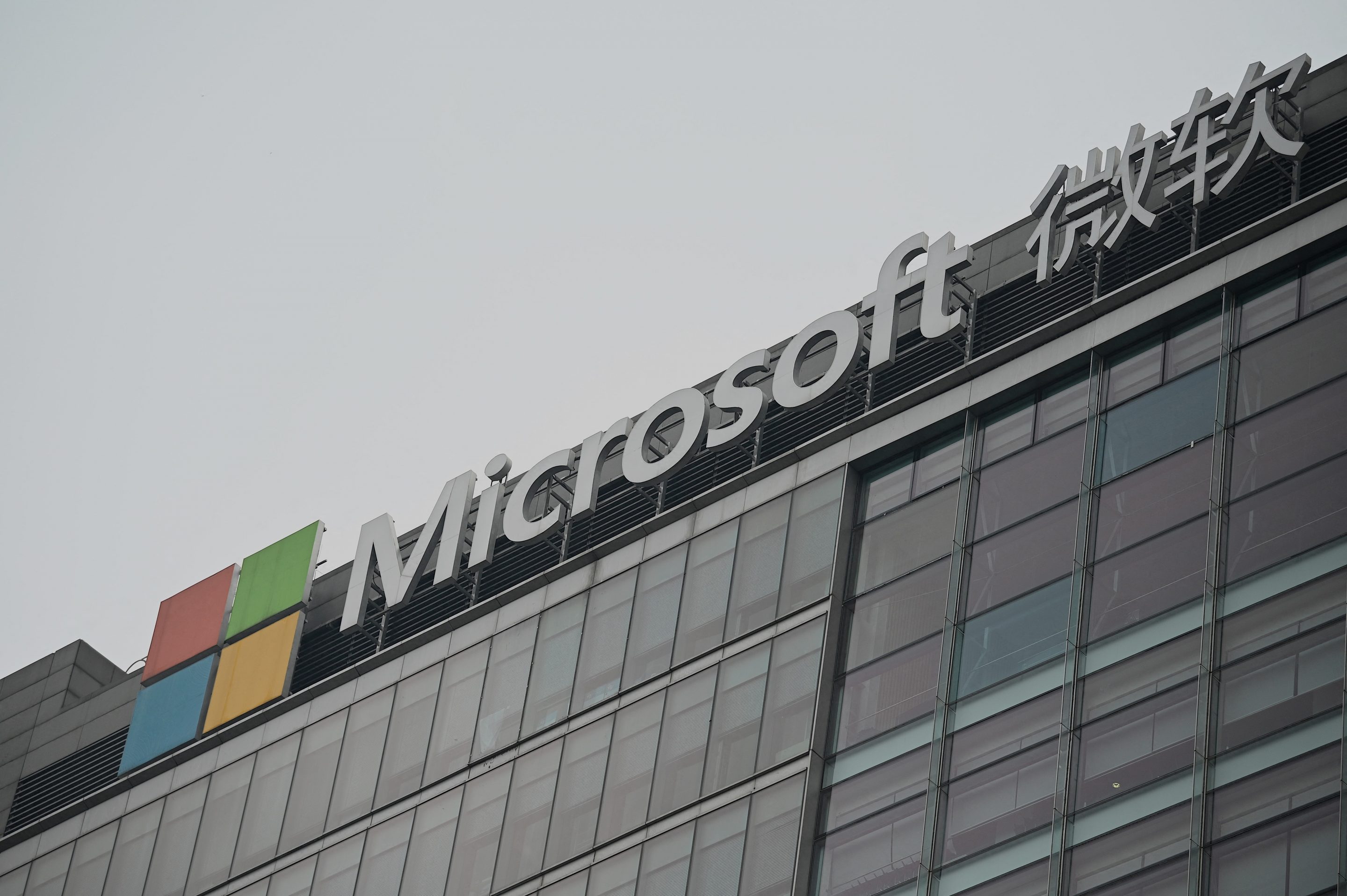 The Microsoft logo is seen at its local headquarters in Beijing on July 20, 2021, the day after the US accused Beijing of carrying out cyber attack on Microsoft and charged four Chinese nationals over "malicious" hack in March. (Photo by Noel Celis / AFP) (Photo by NOEL CELIS/AFP via Getty Images)